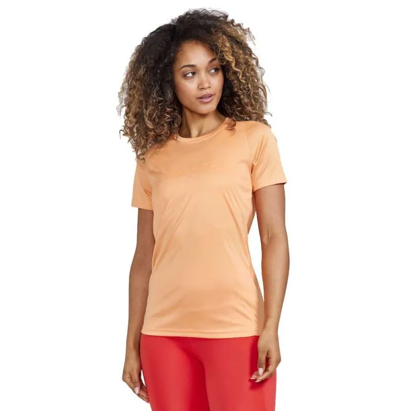 Camiseta trail running Craft Core Essence Logo Tee W (PEACH) mujer