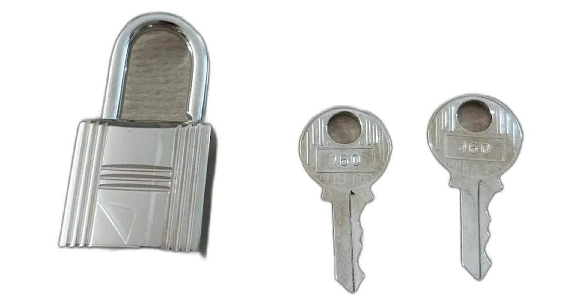 Candado Hermès de acero plateado brillante para Kelly o Birkin Hardware de plata 