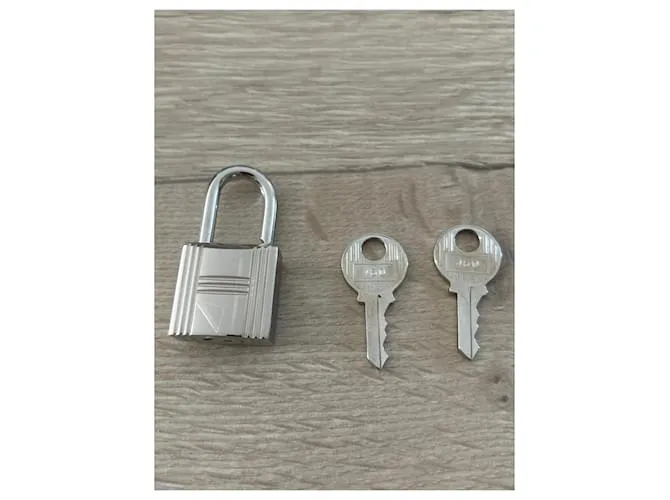 Candado Hermès de acero plateado brillante para Kelly o Birkin Hardware de plata 