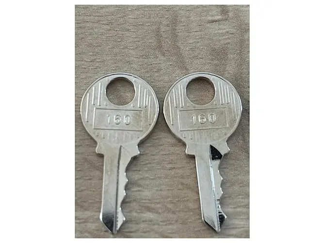 Candado Hermès de acero plateado brillante para Kelly o Birkin Hardware de plata 