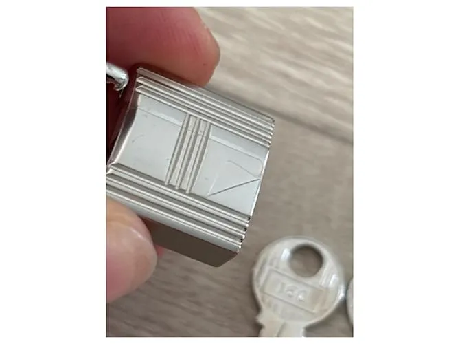 Candado Hermès de acero plateado brillante para Kelly o Birkin Hardware de plata 