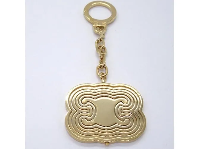 Céline Llave de Oro Triomphe CELINE Dorado 