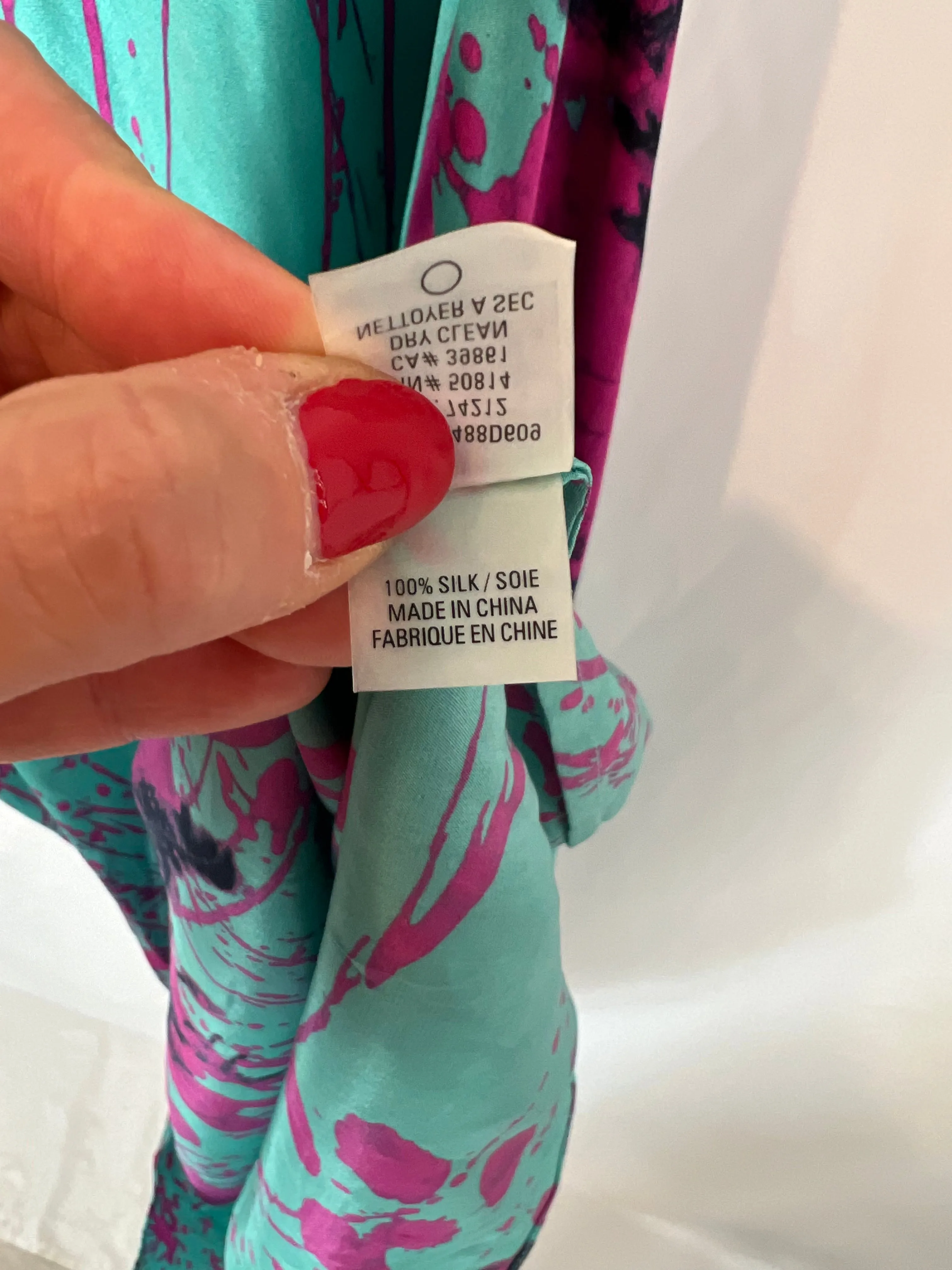 ELIE TAHARI. vestido seda asimétrico T.38