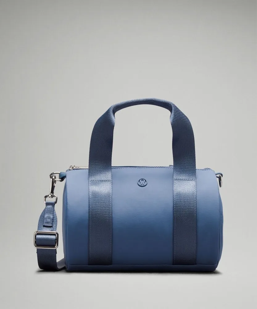LULULEMON MINIBOLSA REDONDA DE NAILON, 5 L AZULES | WX25I7RA