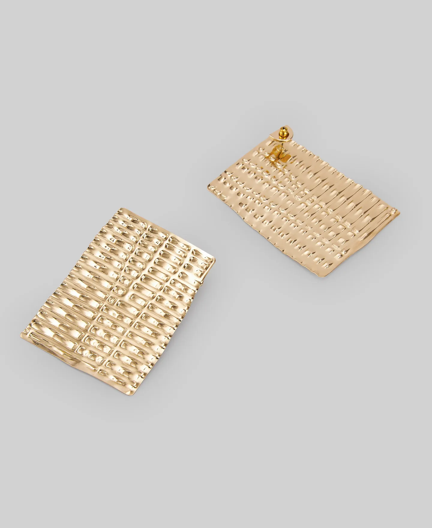 Textured flat earrings woman