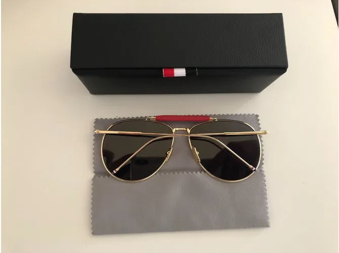 Thom Browne Aviador dorado 