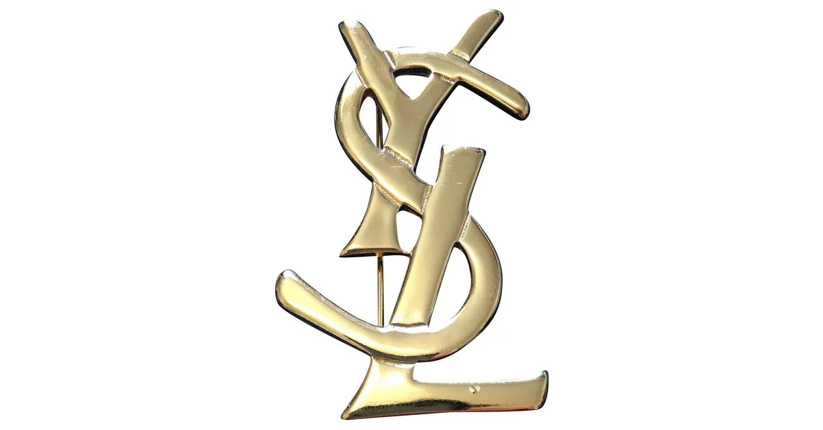 Yves Saint Laurent Alfileres y broches Dorado 