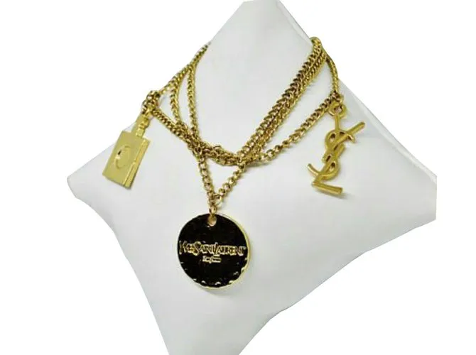 Yves Saint Laurent Esposas Dorado 