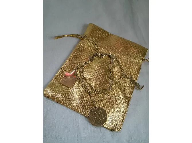 Yves Saint Laurent Esposas Dorado 