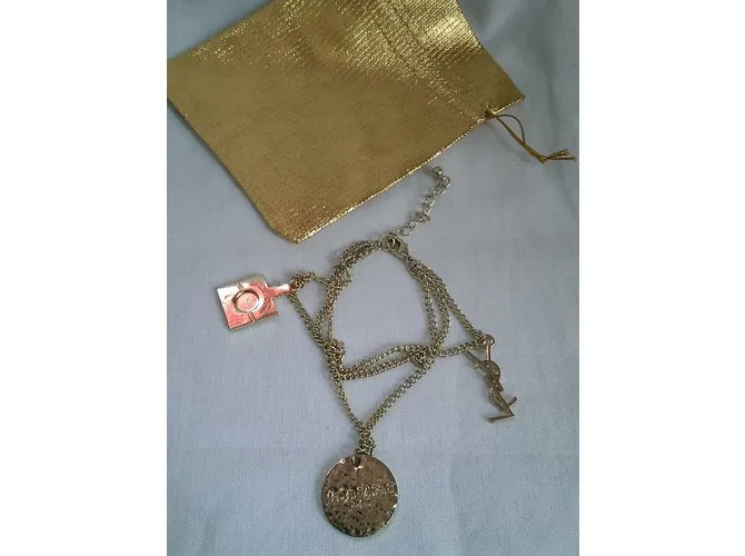 Yves Saint Laurent Esposas Dorado 